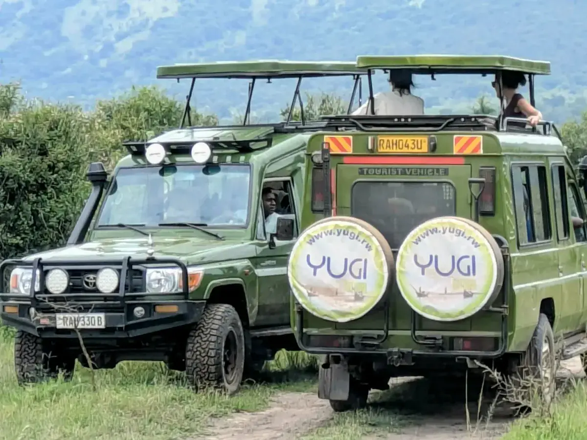 A safari 4×4 on a savannah track in Akagera National Park